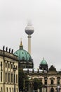 Berlin Cathedral, TV-Tower and Zeughaus Muesum in foggy weather Royalty Free Stock Photo