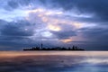 Berlin city silhouette night town on horizon dramatic blue lilac sunset cloudy sky on sea before storm Germany Europe countries na