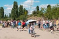 Berlin City street scenery: People in crowded Park Mauerpark o