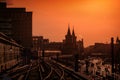 Berlin Cityscape during sunset with train over Oberbaum Bridge between Kreuzberg and Friedrichshain