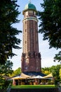 A old brown brick water tower in the Jungfernheide Park Royalty Free Stock Photo