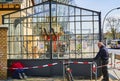 Construction site on the Dresden railway line. You see an excavator that supports the workers in dismantling an old, glass bicycle Royalty Free Stock Photo