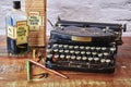 Historical writing utensils on a wooden table