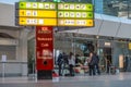 A news team TV is creating content in the empty main Airport Terminal - A, at Berlin Tegel `Otto Lilienthal` Airport,