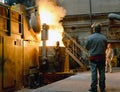 Berlin, Germany - April 18, 2013: Production of metal components in a foundry - group of workers Royalty Free Stock Photo
