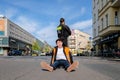 Berlin, Germany - April 24, 2023: Protesters from the group Last Generation sitting on the street and blocking traffic