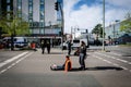 Berlin, Germany - April 24, 2023: Protesters from the group Last Generation sitting on the street and blocking traffic