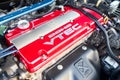 Berlin, Germany - August 20, 2022: Detail closeup view of enhanced Honda DOHC VTEC engine selective focus shot. Royalty Free Stock Photo