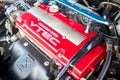 Berlin, Germany - August 20, 2022: Detail closeup view of enhanced Honda DOHC VTEC engine selective focus shot. Royalty Free Stock Photo