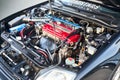 Berlin, Germany - August 20, 2022: Detail closeup view of enhanced Honda DOHC VTEC engine selective focus shot. Royalty Free Stock Photo