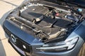 Berlin, Germany - August 20, 2022: engine cover in engine bay of third generation Volvo S60 car selective focus side Royalty Free Stock Photo