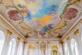 BERLIN, GERMANY - AUGUST 11, 2017: Paintings on a ceiling damaged during WW2 at Charlottenburg Palace in Berlin, Germa