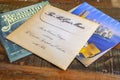 Some record covers from the seventies on a wooden table