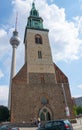 TV Tower, and the spire of St Mary`s Church, Alexander Platz, Berlin, Germany
