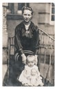 Mother baby doll wearing vintage clothing Old photo Royalty Free Stock Photo