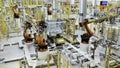 Berlin - Germany, december 6, 2022: Automobile plant, modern production of cars. Scene. Robots at work, build process in