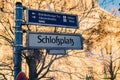 Berlin, Germany - December 02, 2016: Road sign direction to Schlafplatz, alexanderplatz,Brandenburg Gate Royalty Free Stock Photo