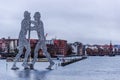 View of the aluminum sculpture the Molecule Man in the city of Berlin, capital of Germany, from the Elsen Bridge
