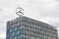 BERLIN, GERMANY. An emblem of the Mercedes-Benz company on a roof of the building of Europa Center