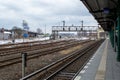 Railroad platform winter scene in Berlin, Germany, with empty tracks and platform