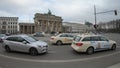 Taxis In Front of Brandenburger Tor In Berlin, Germany Royalty Free Stock Photo