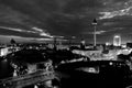 Illuminated landmarks in Berlin, Germany in the morning. Colorful cloudy sky at sunrise. Black and white