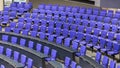 Empty, blue seats at the Deutscher Bundestag.