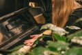 Beautiful hands with long fingers of a girl with black varnished nails playing piano