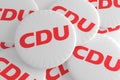 German Election Politics Badges Concept: Pile of CDU Buttons, 3d illustration