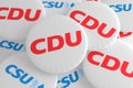 German Election Politics Badges: Pile of Buttons With The Logo of The Political Parties CDU And CSU, 3d illustration