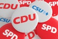 German Politics Coalition Concept: Pile of Buttons With The Logo of The Political Parties CDU, CSU, SPD, 3d illustration