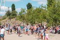 Berlin City street scenery: People in crowded Park Mauerpark o