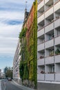 BERLIN, GERMANY - July 28, 2018: Exquisite upwards view of a colorful living wall in a residential building in front of