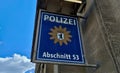 Label of the police station fixed on the building\'s wall