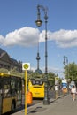 Lamp post against the background of a television tower on a street in Berlin