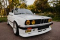 Berlin, Germany - July 07, 2020: Original BMW M3 e30 outdors, BBS wheels, tunning M Tech, glossy and shiny old classic ci