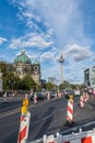 BERLIN, GERMANY - July 28, 2018: Perspective from a busy half-closed avenue with street signs near the ancient Berliner