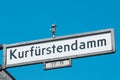 Street name sign of the famous shopping street Kurfuerstendamm Royalty Free Stock Photo