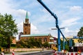 View of the church of St. Matthaus framed by water pipeline in Berlin