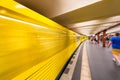 BERLIN, GERMANY - JULY 23, 2016: Yellow subway train speeding up Royalty Free Stock Photo