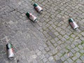 Becks Beer Cans On Paving Stones With Moss In The Gaps