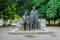 Karl Marx and Friedrich Engels statue at Marx-Engels-Forum public park in Berlin, Germany Royalty Free Stock Photo