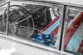 Old Cadillac oldtimer car interior with american Flag on front s Royalty Free Stock Photo