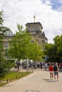 Berlin, Germany - June 29, 2022: The Reichstag Building, seat of the german parliament, the Bundestag. The german flag on a Royalty Free Stock Photo