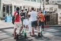 Tourist group riding Electric scooter , escooter or e-scooter on street in Berlin