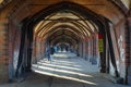 BERLIN, GERMANY, MARCH 12, 2015: brick arcs of oberbaumbrucke creates covered passage for pedestrians in berlin....IMAGE