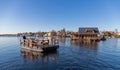 Berlin, Germany - March 13, 2022, Mueggelsee with the restaurant Spree Arche on the water. Visitors are taken to the