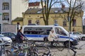 Street scene with a policecar, cyclists and other traffic Royalty Free Stock Photo