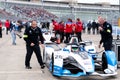 Bmw staff members checking a race car