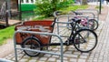 Berlin, Germany - May 21, 2022: Cargo bike tied to a bike rack.